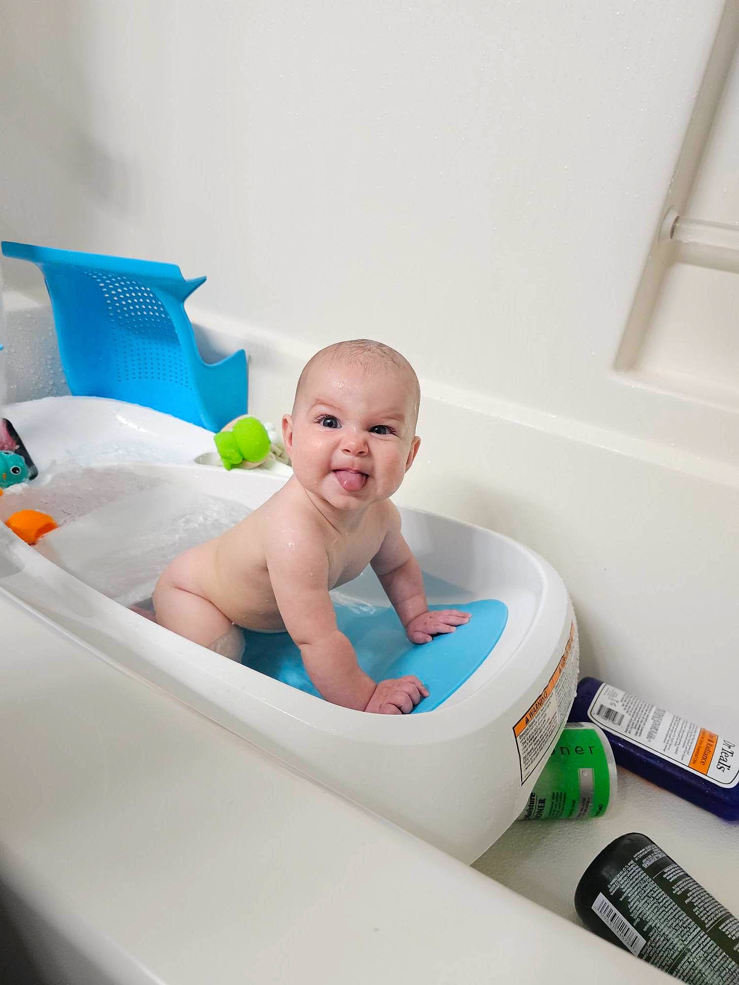 Maeve joined the competition — help win amazing prizes! baby, baby_bathing, baby_products, baby_safety, bathing, child, cleanliness, comfort, event, flooring, fun, happy, leisure, person, personal_care, plastic, plumbing_fixture, room, sitting, smile