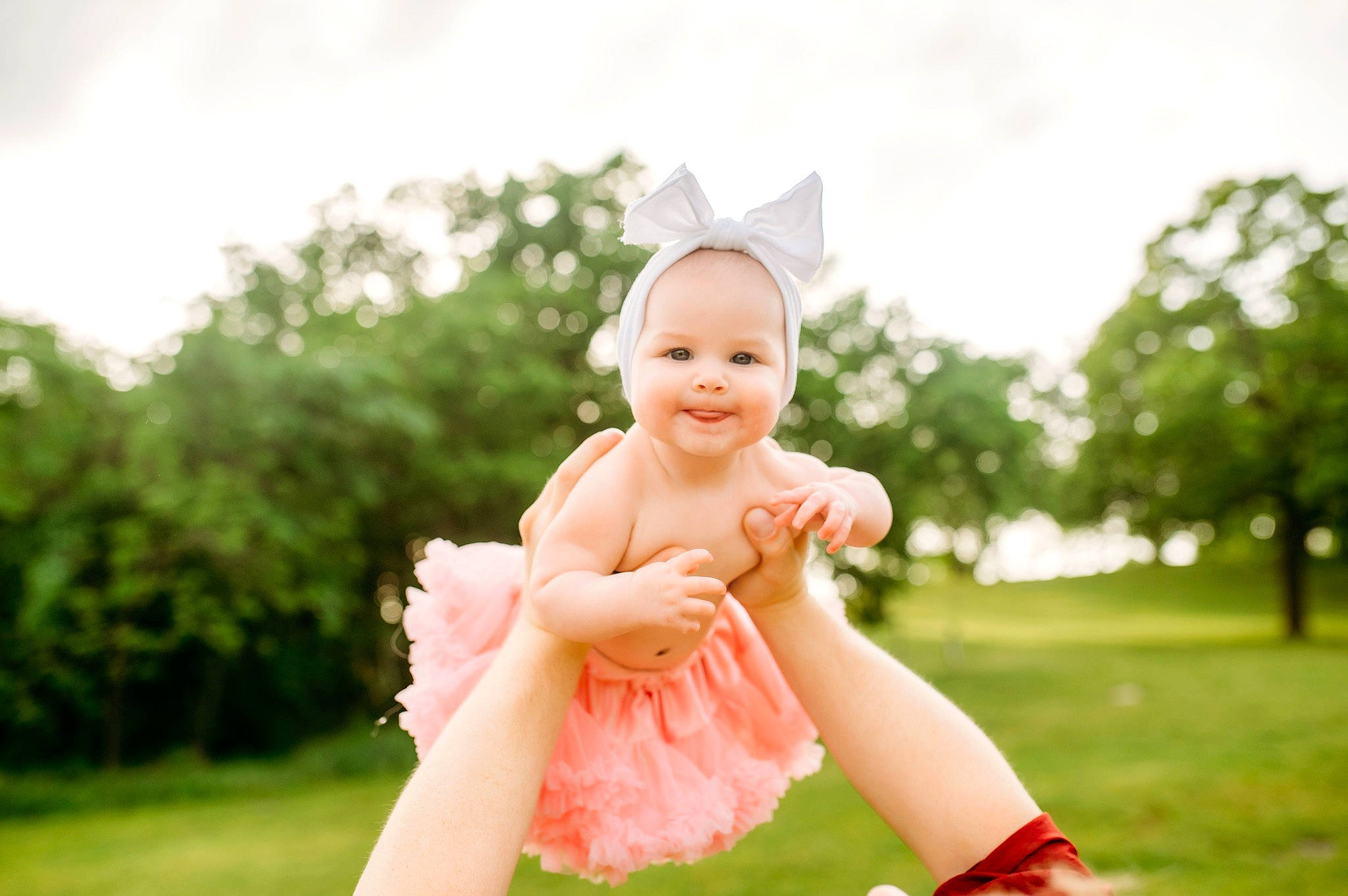 Maeve joined the competition — help win amazing prizes! baby, event, face, flash_photography, fun, gesture, grass, grassland, happy, joy, lawn, leisure, meadow, people_in_nature, person, pink, plant, recreation, sky, smile