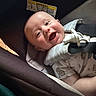 baby, baby_boy, baby_girl, car_seat, child, closeup, clothing, cute, face, happy, indoors, infancy, infant, portrait, safety, seat, seatbelt, smiling, straps, toddler