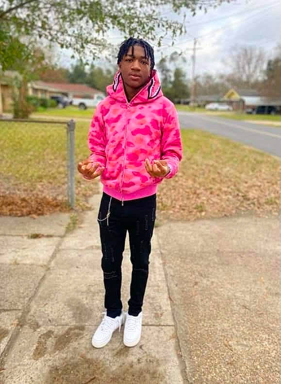 Antonio joined the competition — help win amazing prizes! asphalt, denim, eye, face, fashion_accessory, fur, grass, hair, happy, leisure, magenta, pattern, pedestrian, person, plant, recreation, road, road_surface, sleeve, tree