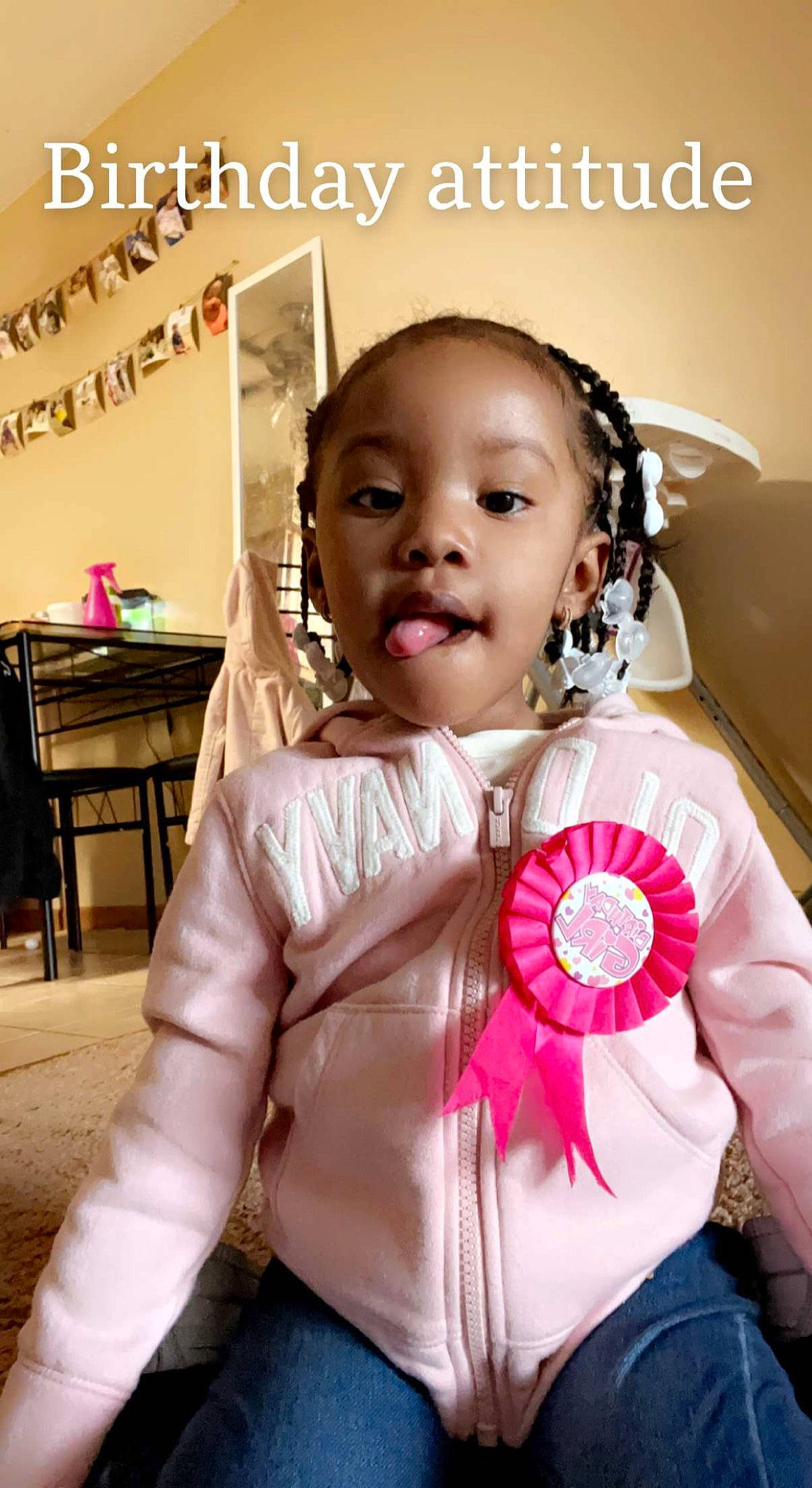 Ambrielle is registered to the contest to win money with this photo: audio_equipment, baby, baby_toddler_clothing, chair, cheek, child, denim, eyelash, fashion_accessory, flash_photography, fun, happy, head, jewellery, magenta, person, pink, skin, sleeve, table