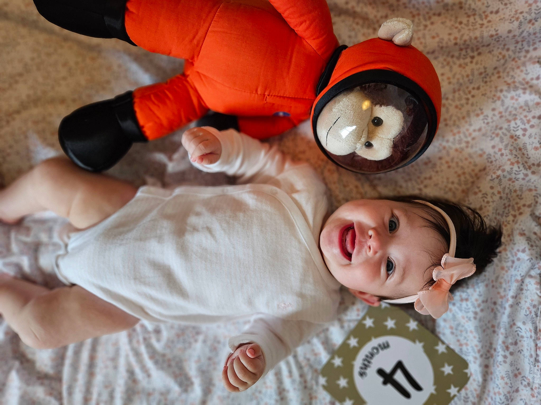 Eva joined the competition — help win amazing prizes! baby, baby_products, baby_toddler_clothing, carmine, child, comfort, fun, happy, head, headwear, mammal, mouth, person, personal_protective_equipment, sleeve, smile, stuffed_toy, textile, thigh, toddler