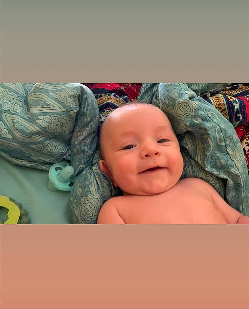 Brysen joined the competition — help win amazing prizes! baby, baby_products, baby_sleeping, baby_toddler_clothing, bedding, child, comfort, eyebrow, fun, happy, headwear, iris, linens, magenta, mouth, pattern, person, portrait_photography, room, sleeve