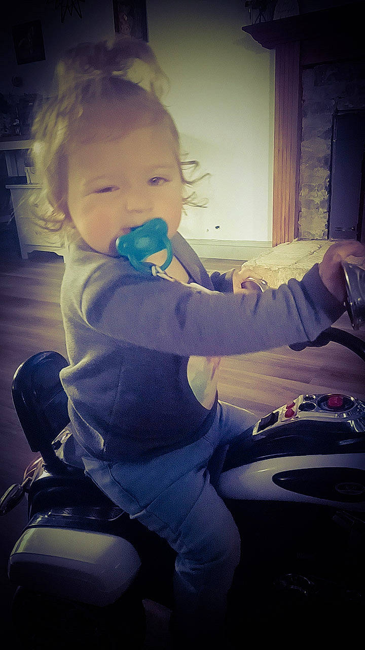 Mia Galloway is registered to the contest to win money with this photo: arm, automotive_design, automotive_lighting, baby, cloud, cool, drinkware, electric_blue, finger, flash_photography, fun, glass, hand, happy, person, product, sitting, sports_equipment, style, tints_and_shades