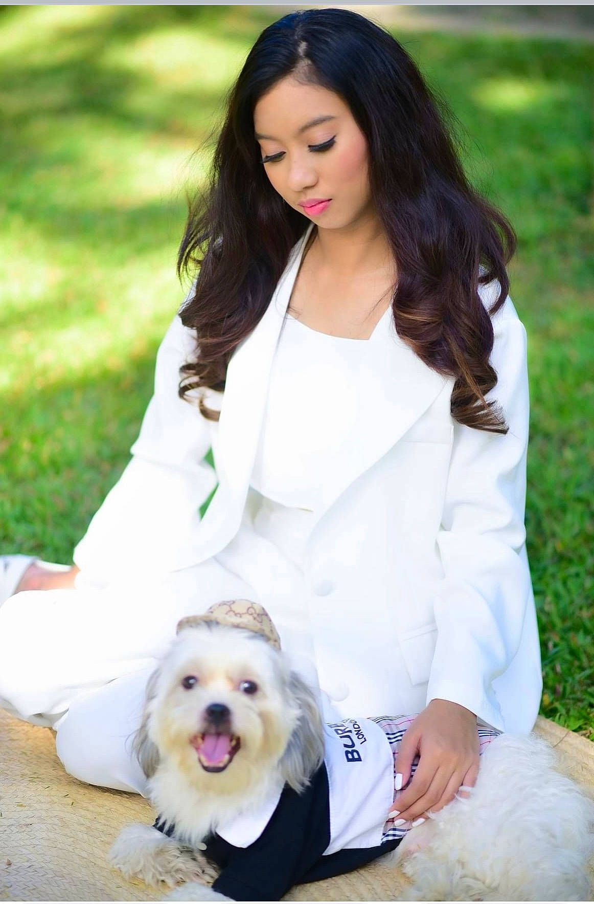 adult, animal, blazer, canine, clothing, coat, dress, face, female, formalwear, grass, head, jacket, lady, person, photography, plant, portrait, suit, woman