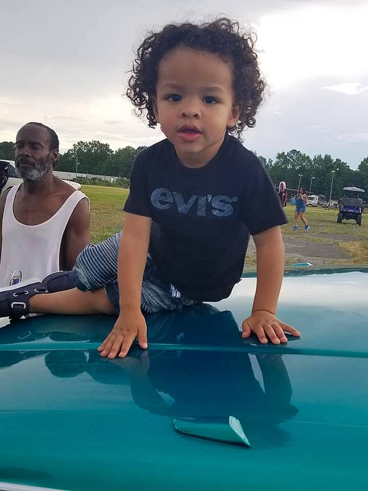 Drayden joined the competition — help win amazing prizes! auto_part, car, child, cool, family_car, fun, glass, happy, hood, leisure, luxury_vehicle, person, play, recreation, smile, summer, t_shirt, toddler, vacation, vehicle