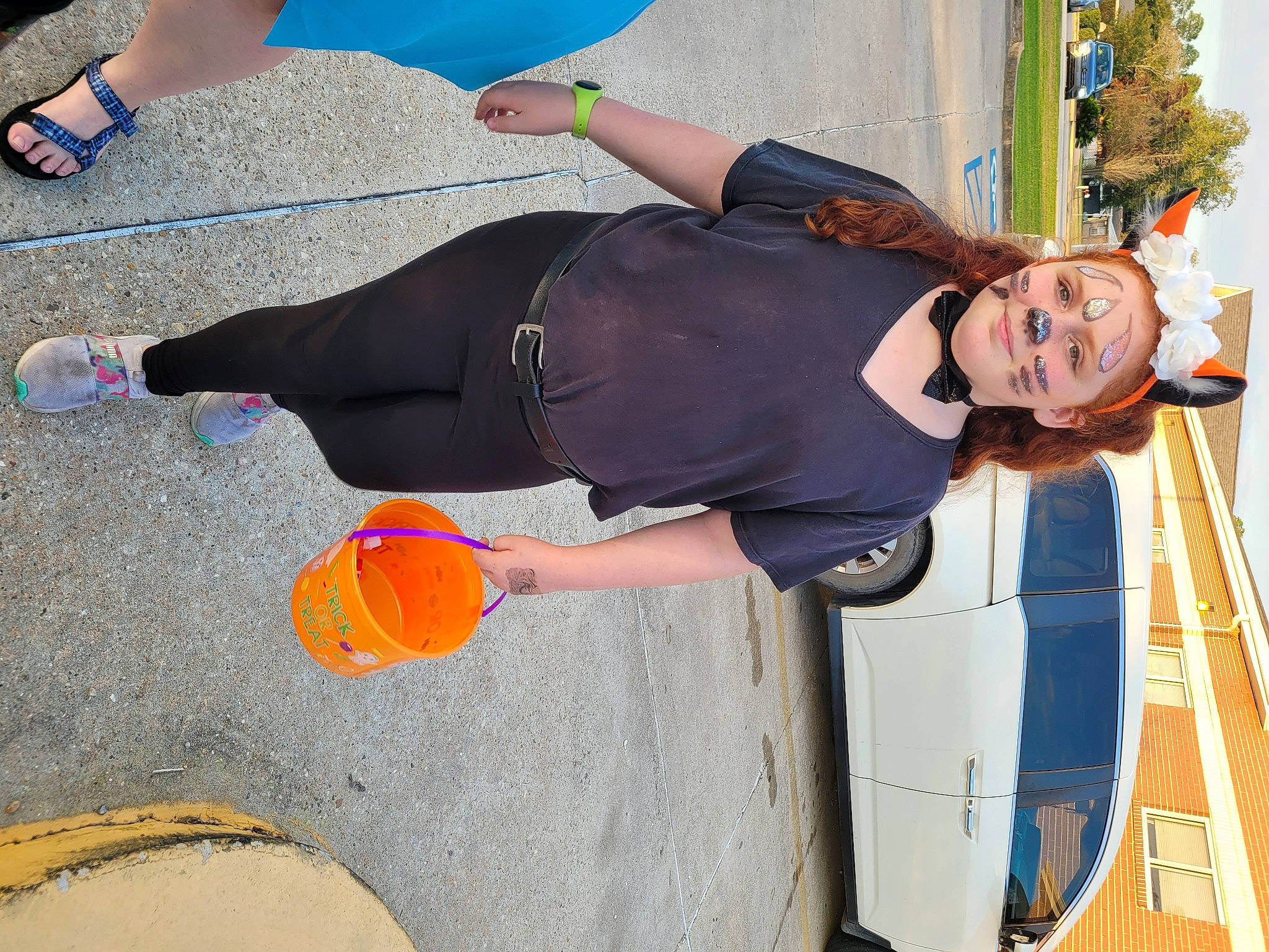 Angelle is registered to the contest to win money with this photo: blue, boat, clothing, electric_blue, family_car, fun, hat, human_leg, knee, leg, leisure, person, plant, recreation, shoe, smile, thigh, tree, vehicle, vehicle_door