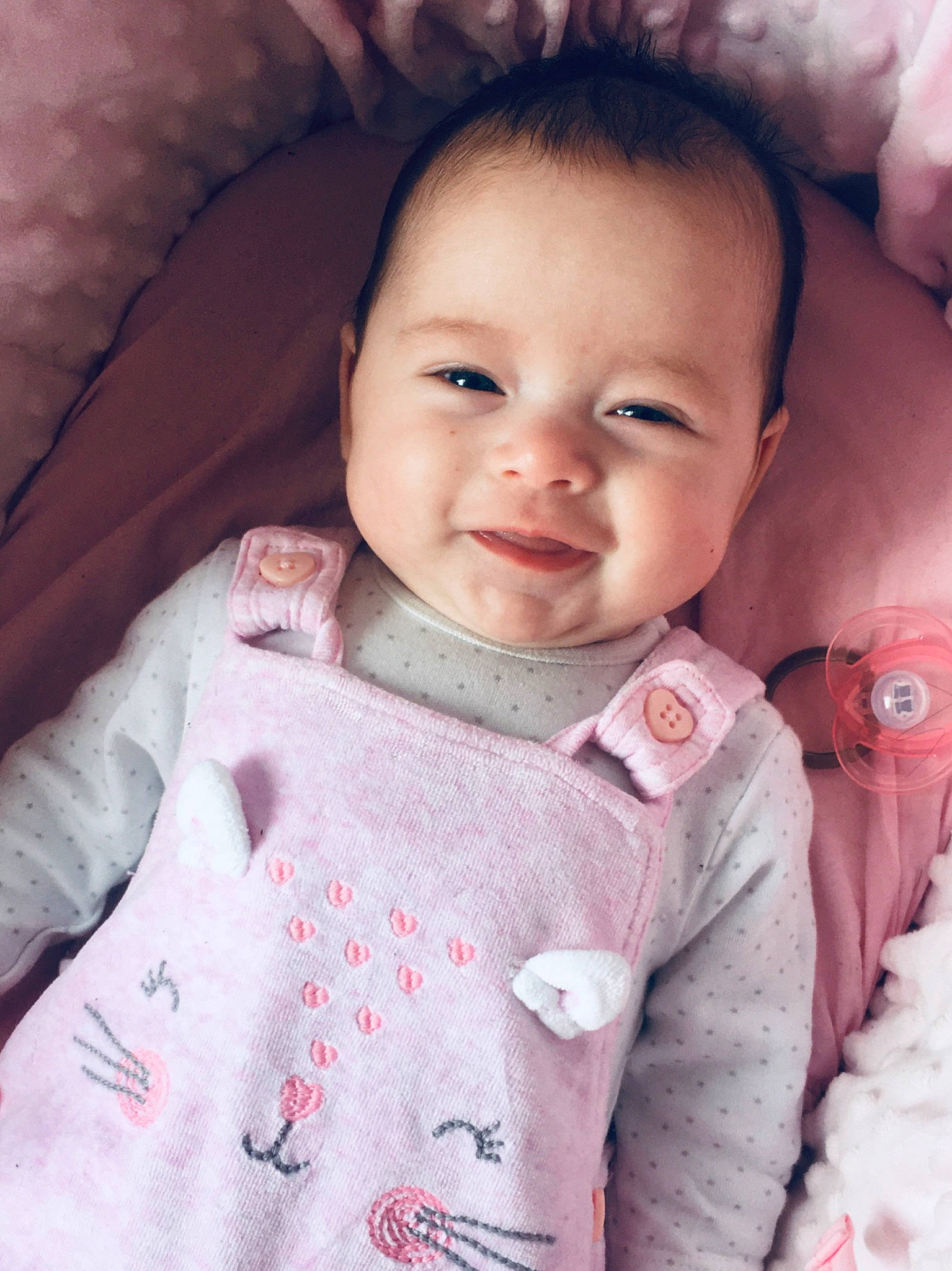 Georgie is registered to the contest to win money with this photo: baby, beauty, cheek, child, chin, eye, eyebrow, face, facial_expression, forehead, head, iris, joy, lip, mouth, nose, person, pink, skin, smile