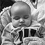 Nélya participe au concours pour gagner de l'argent avec cette photo : baby, sleeping, blanket, clothing, face, head, infant, portrait, soft, towel, texture, closeup, peaceful, child, resting, indoors, cute, cozy, monochrome, young