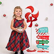 Evelynn joined the competition — help win amazing prizes! ball, candy, child, cricket, cricketball, face, female, food, football, girl, head, lollipop, person, photography, portrait, soccer, soccerball, sport, sweets, tartan