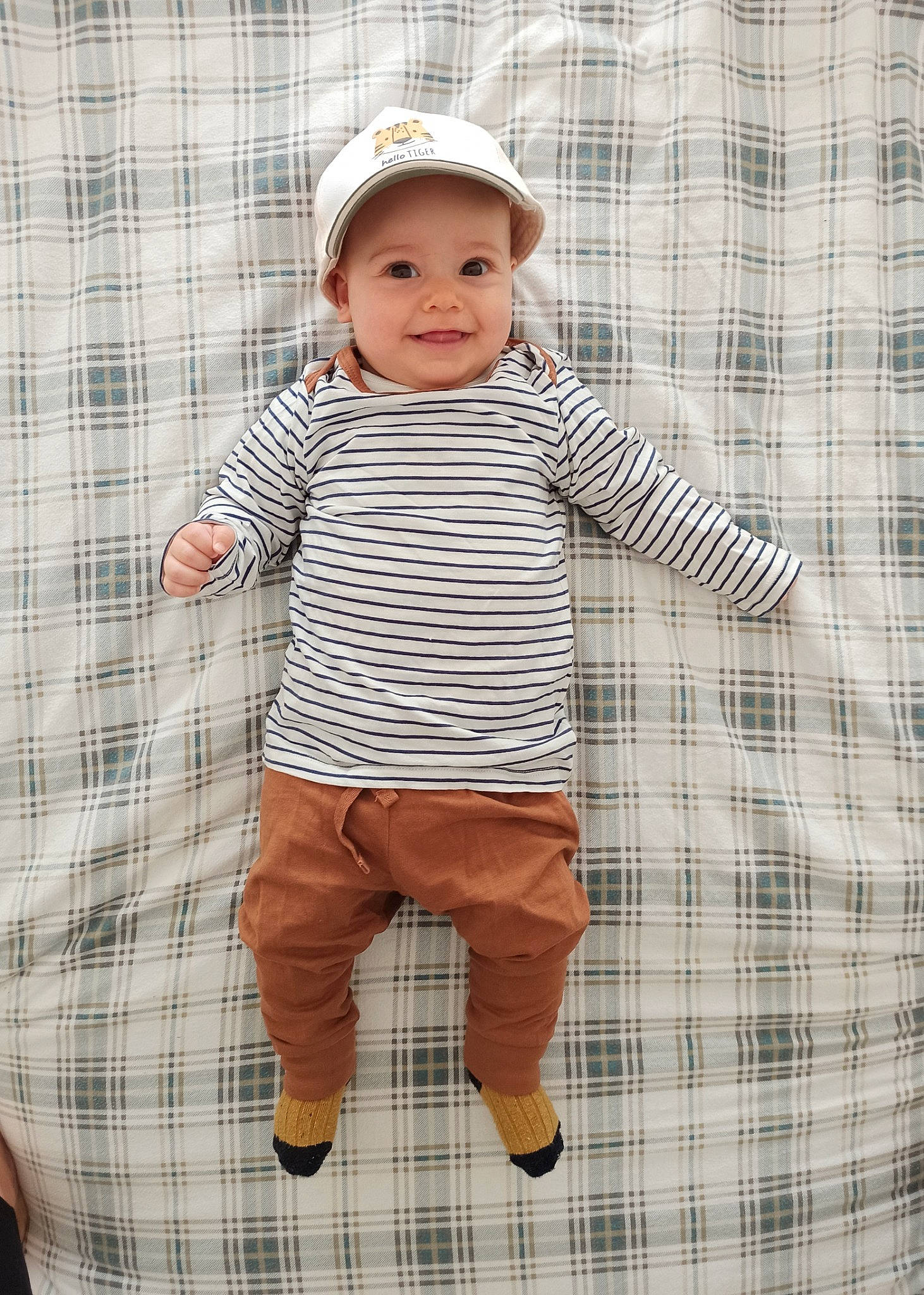 Nico participe au concours pour gagner de l'argent avec cette photo : baby, baby_toddler_clothing, child, collar, dress_shirt, face, headwear, joy, outerwear, pattern, person, plaid, product, shorts, sleeve, smile, standing, street_fashion, t_shirt, tartan
