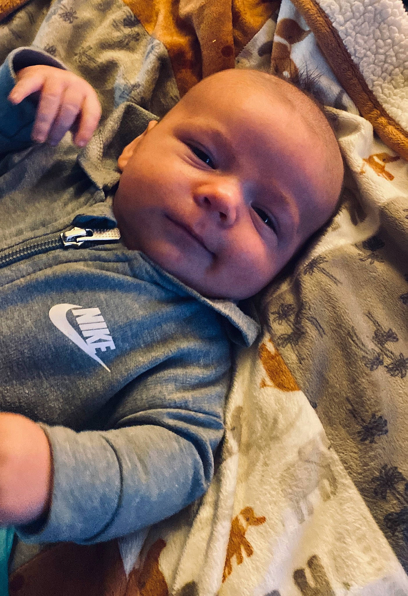 Zaydon joined the competition — help win amazing prizes! baby, baby_toddler_clothing, cheek, comfort, eye, finger, gesture, happy, head, human, human_body, mammal, nose, person, skin, smile, textile, toddler, tree, vertebrate