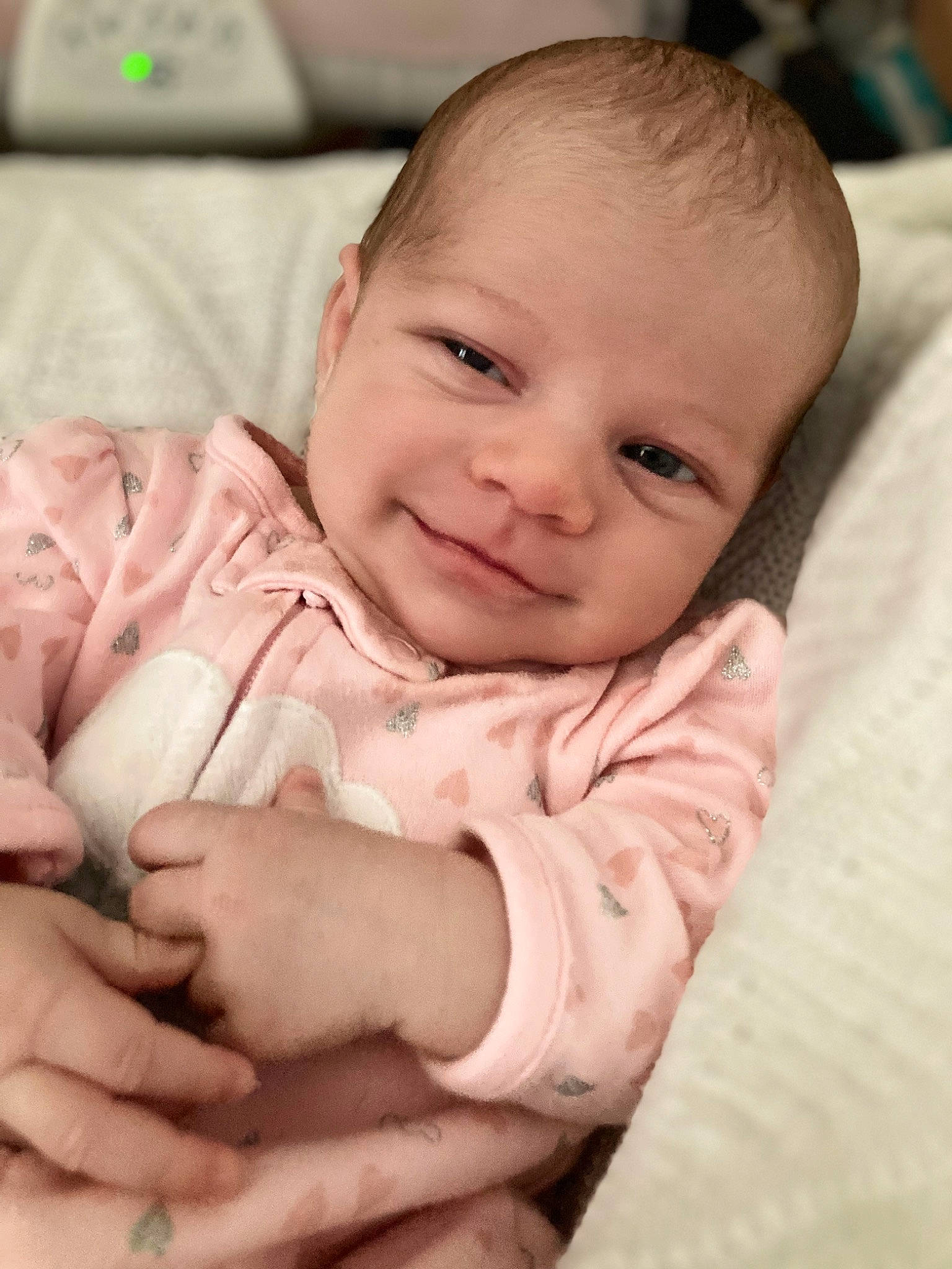 Milagros joined the competition — help win amazing prizes! baby, baby_toddler_clothing, cheek, chin, comfort, finger, gesture, hand, happy, mammal, nose, person, pink, product, skin, sleeve, smile, stomach, textile, thumb