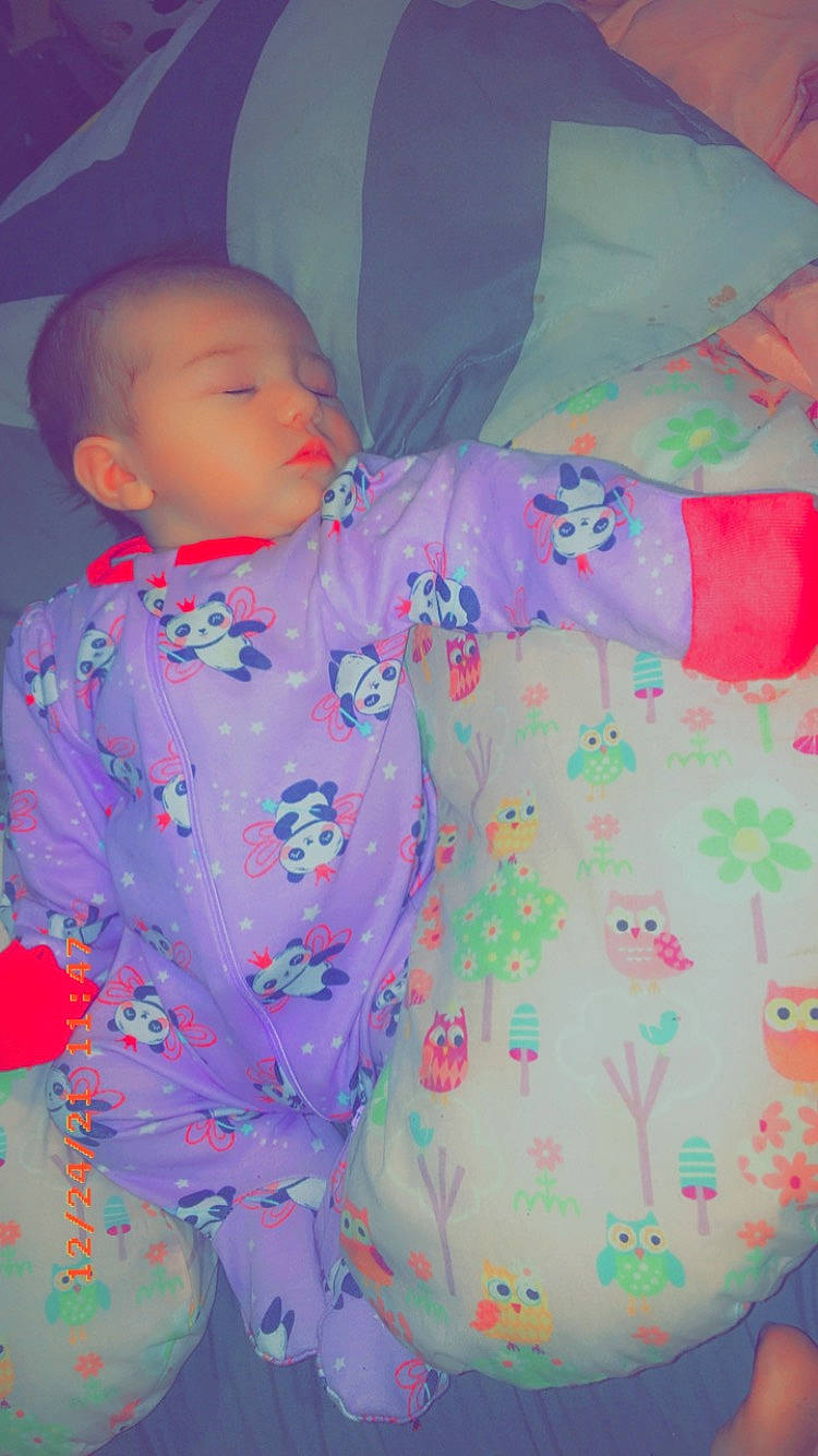 Oaklynn Reeves is registered to the contest to win money with this photo: baby, baby_toddler_clothing, child, comfort, design, electric_blue, eye, flower, fun, linens, magenta, pattern, peach, person, petal, pink, product, sleeve, textile, toddler