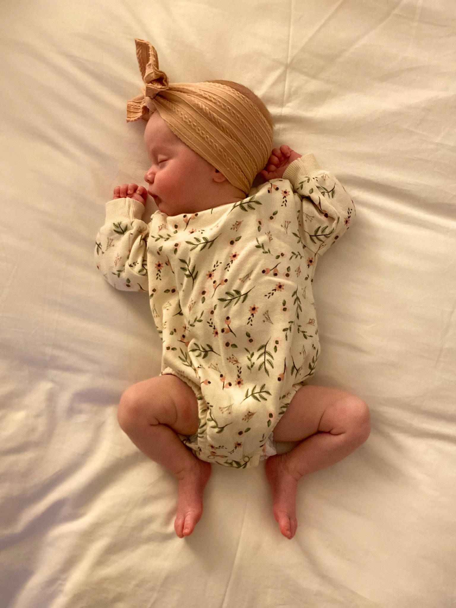 Olivia Rose joined the competition — help win amazing prizes! baby, baby_toddler_clothing, barefoot, comfort, dress, face, fawn, finger, flooring, foot, human_leg, linens, nail, pattern, peach, person, sleeve, textile, thumb, toddler