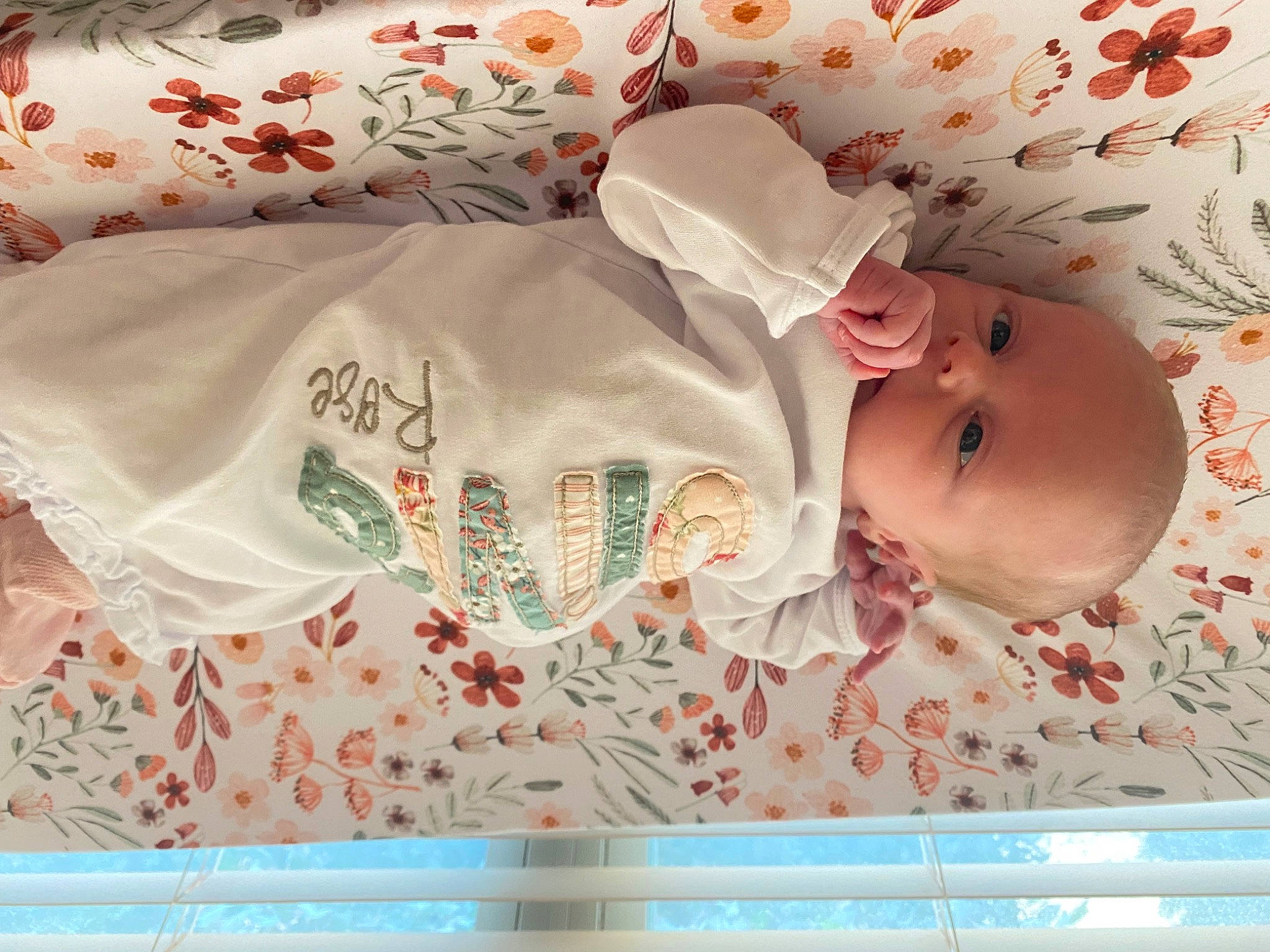 Olivia Rose joined the competition — help win amazing prizes! baby, baby_products, baby_safety, baby_sleeping, baby_toddler_clothing, baby_toys, bedding, child, fashion_accessory, font, linens, orange, pattern, peach, person, pink, product, room, sleeve, textile