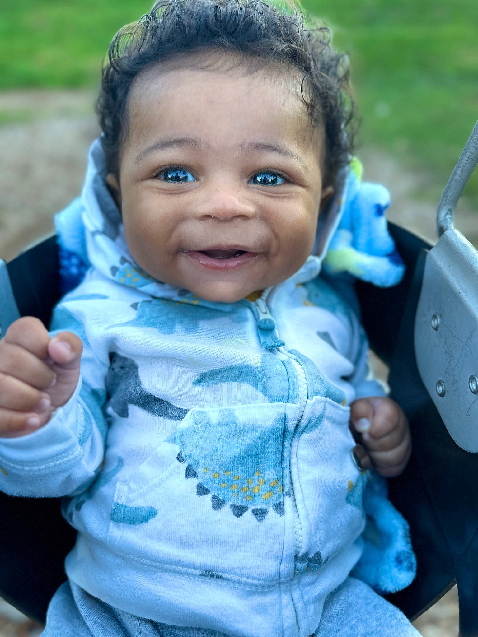 Carter joined the competition — help win amazing prizes! azure, baby, blue, cheek, eye, facial_expression, green, hand, happy, head, human_body, iris, person, plant, product, skin, sleeve, smile, standing, tree
