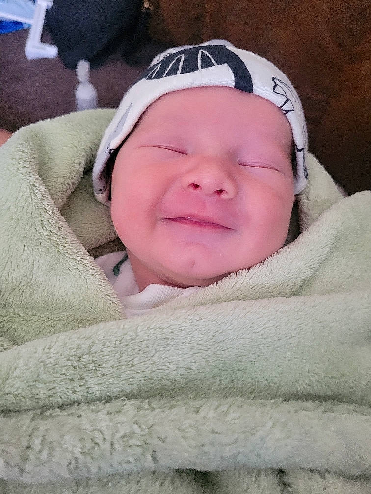 Kolsyn is registered to the contest to win money with this photo: baby, baby_toddler_clothing, carmine, cheek, child, comfort, eyewear, fun, grass, happy, headwear, linens, magenta, mouth, person, skin, sleeve, smile, toddler