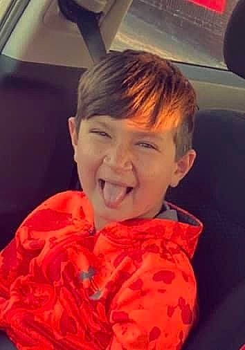 Jaxon joined the competition — help win amazing prizes! arm, automotive_design, automotive_exterior, carmine, child, cool, eye, family_car, forehead, fun, happy, jaw, lip, mouth, nose, orange, person, personal_protective_equipment, smile, vehicle_door