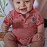 Connor joined the competition — help win amazing prizes! baby, background, blanket, blue_eyes, child, chubby_legs, cute, cute_expression, face, hand, happy, indoors, infant, onesie, portrait, red_stripes, sitting, smiling, soft_light, teeth