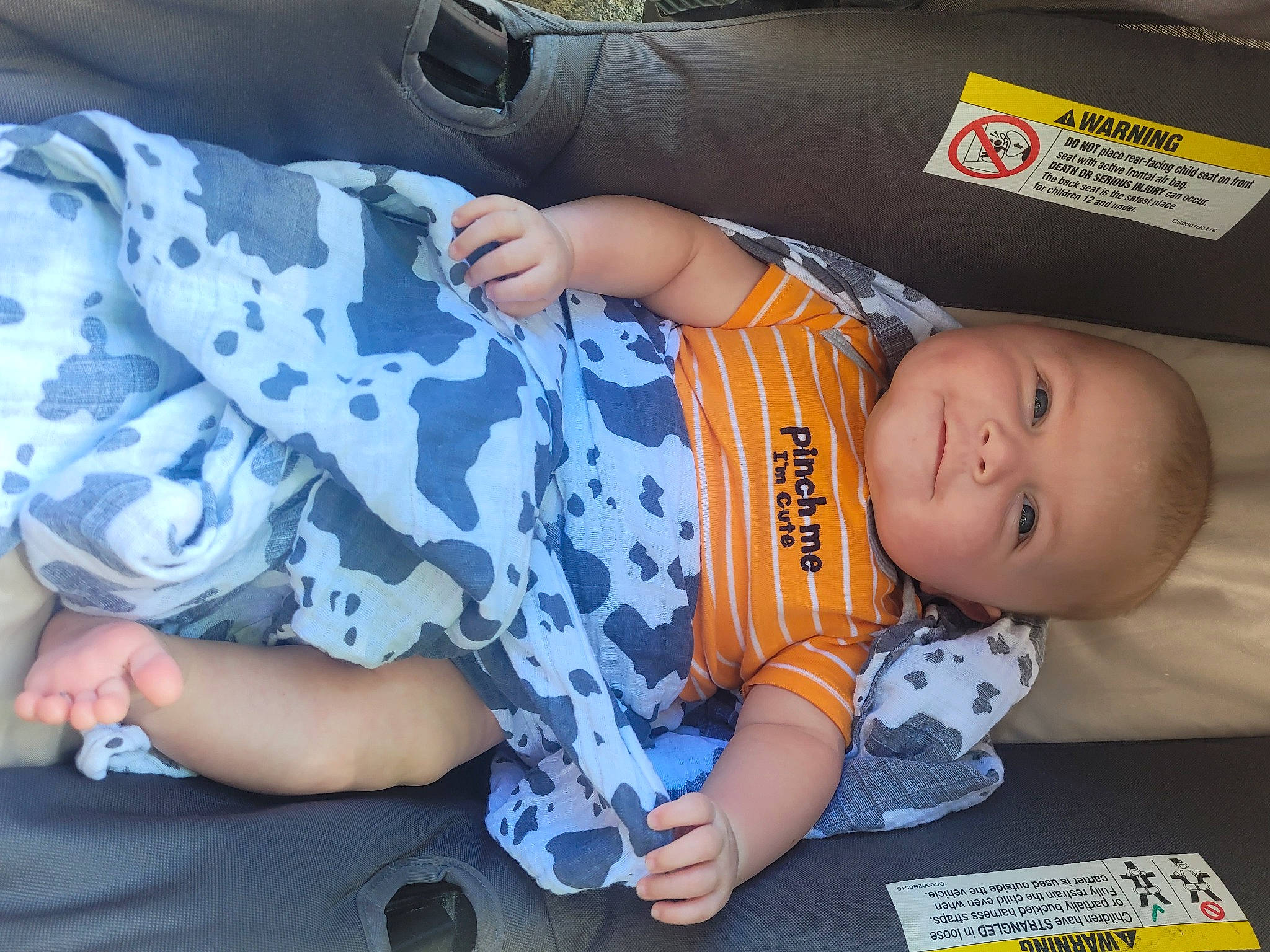 Axel is registered to the contest to win money with this photo: automotive_exterior, baby, baby_carriage, baby_products, baby_toddler_clothing, car_seat, car_seat_cover, child, comfort, family_car, flooring, fun, human_leg, pattern, person, play, sitting, t_shirt, toddler, vacation