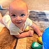 baby, child, infant, smile, face, eyes, carpet, floor, toy, colorful, playtime, crawling, home, cute, skin, short_hair, white_clothing, indoors, person, happy
