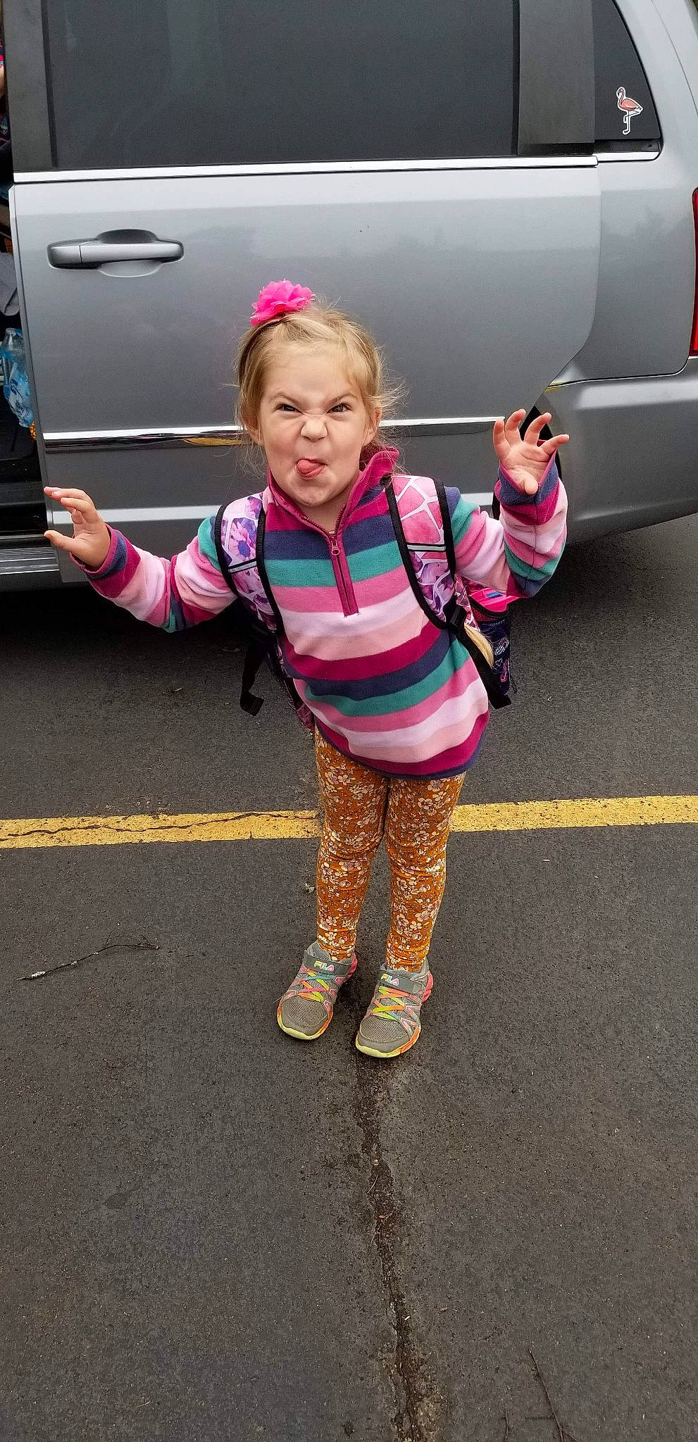 Anneva is registered to the contest to win money with this photo: anger, arm, asphalt, auto_part, automotive_design, automotive_exterior, automotive_lighting, bumper, child, footwear, fun, happy, leg, magenta, motor_vehicle, person, pink, sleeve, sneakers, toddler