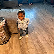Kali is registered to the contest to win money with this photo: adult, boy, child, clothing, couch, face, furniture, hardwood, head, indoors, interiordesign, jeans, male, man, pants, person, photography, portrait, sitting, wood