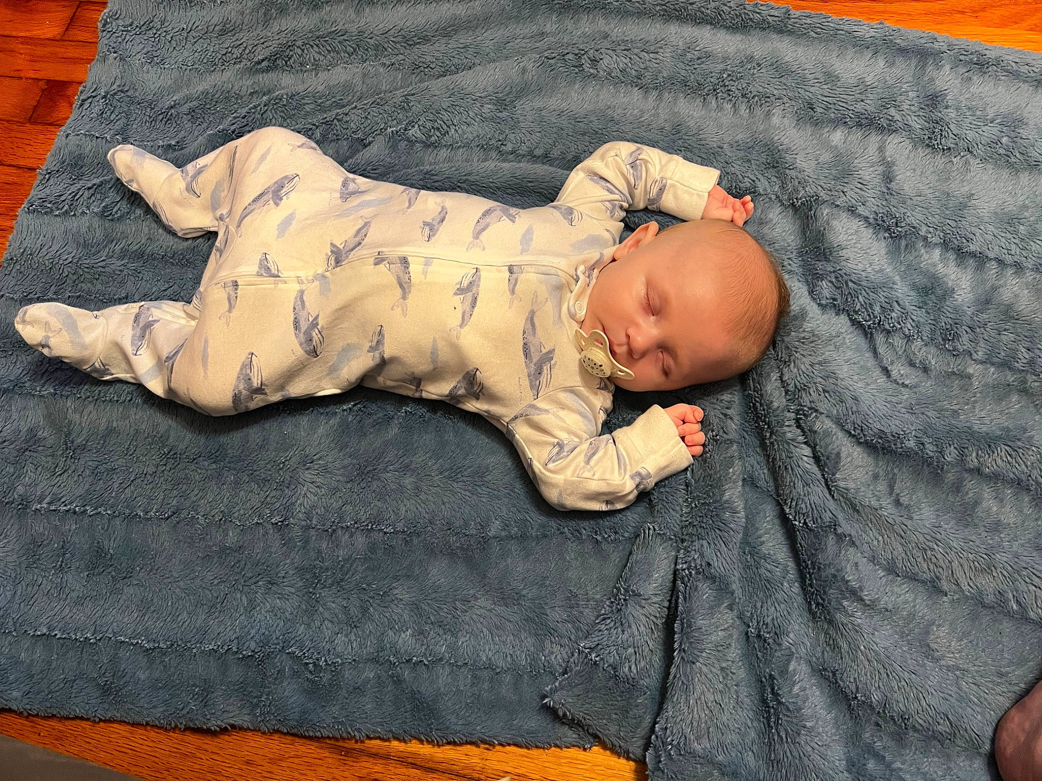 Beau is registered to the contest to win money with this photo: art, baby, baby_products, baby_sleeping, baby_toddler_clothing, bedtime, child, comfort, face, flooring, head, infant_bodysuit, linens, nap, pattern, person, sitting, sleep, sleeve, toddler