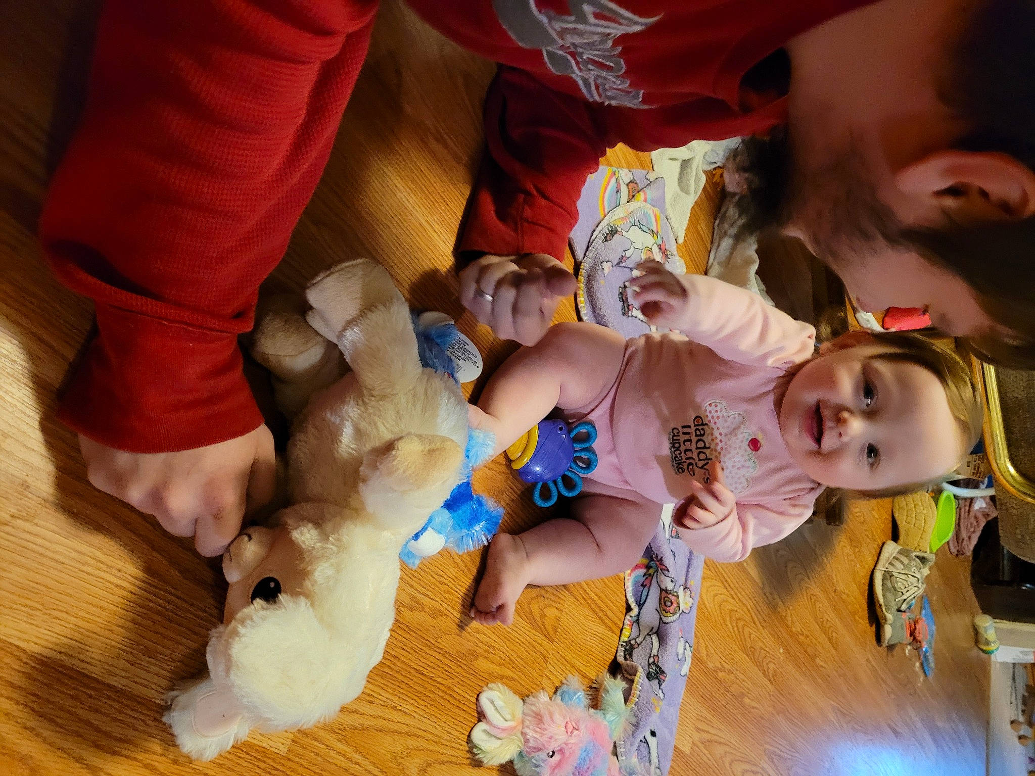 Lillian joined the competition — help win amazing prizes! baby, child, companion_dog, finger, flooring, fun, happy, hardwood, leisure, orange, person, play, skin, smile, stuffed_toy, toddler, toy, vacation, vertebrate, wood