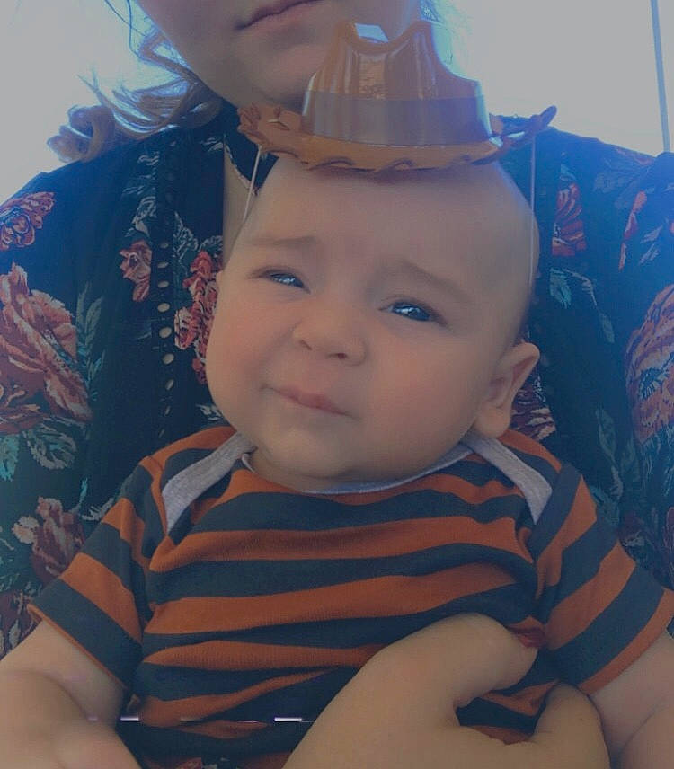 Jordan is registered to the contest to win money with this photo: baby, baby_toddler_clothing, cap, cheek, cloud, cool, ear, eye, eyebrow, eyelash, finger, forehead, happy, iris, lip, mouth, nose, organ, person, skin