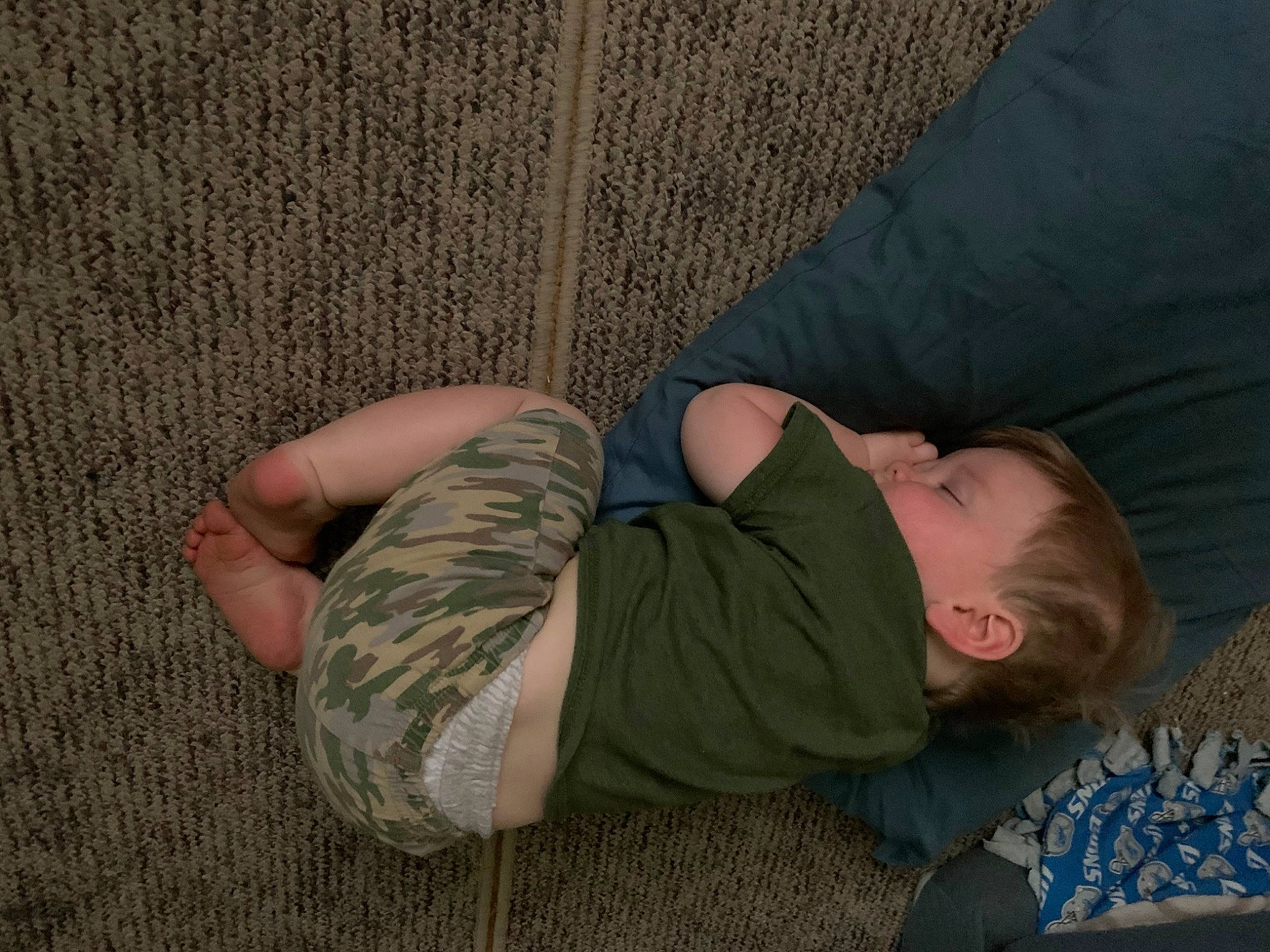 Bradyn is registered to the contest to win money with this photo: arm, child, comfort, leg, nap, person, sleep