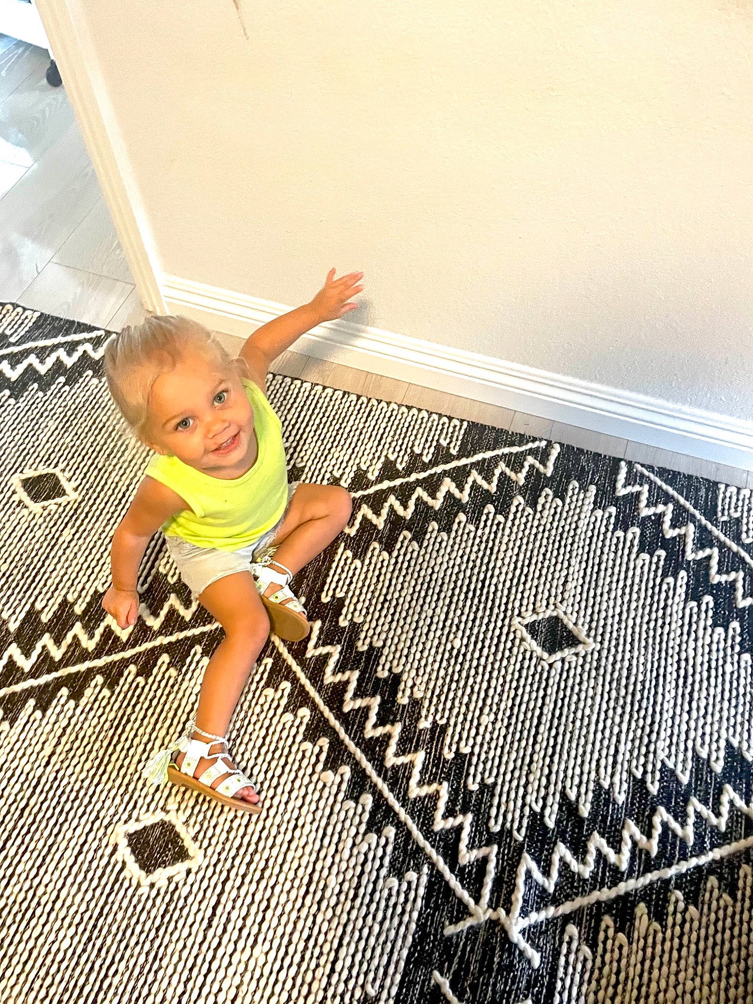Presley Bassett is registered to the contest to win money with this photo: baby, baby_toddler_clothing, floor, flooring, fun, happy, human_leg, joy, leg, leisure, mesh, metal, pattern, person, product, rectangle, smile, symmetry, t_shirt, tints_and_shades
