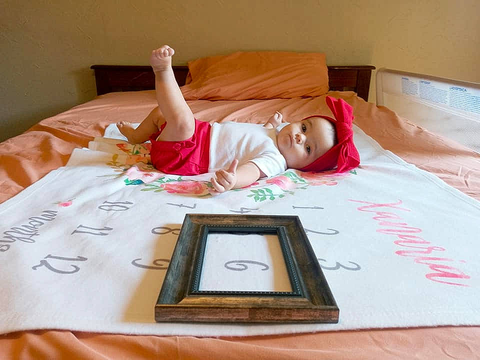 Xanaria Elizabeth Jo joined the competition — help win amazing prizes! bed, bed_sheet, bedding, bedroom, child, comfort, design, flooring, font, furniture, illustration, linens, magenta, person, rectangle, room, t_shirt, table, tableware, textile