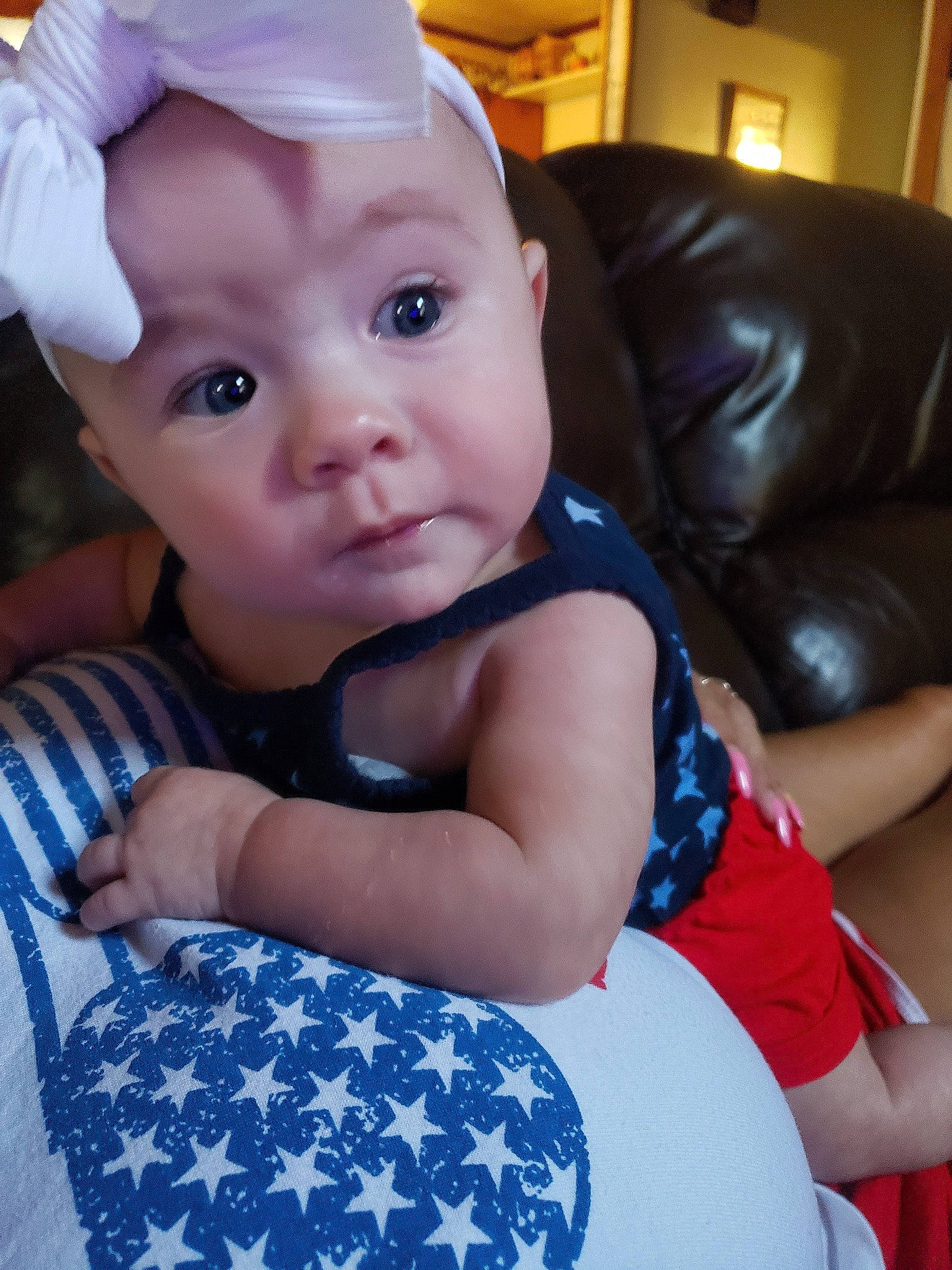 Aylah is registered to the contest to win money with this photo: arm, baby, baby_toddler_clothing, beauty, black, blue, cap, cheek, comfort, electric_blue, finger, happy, hat, iris, lip, person, skin, sleeve, textile, toddler