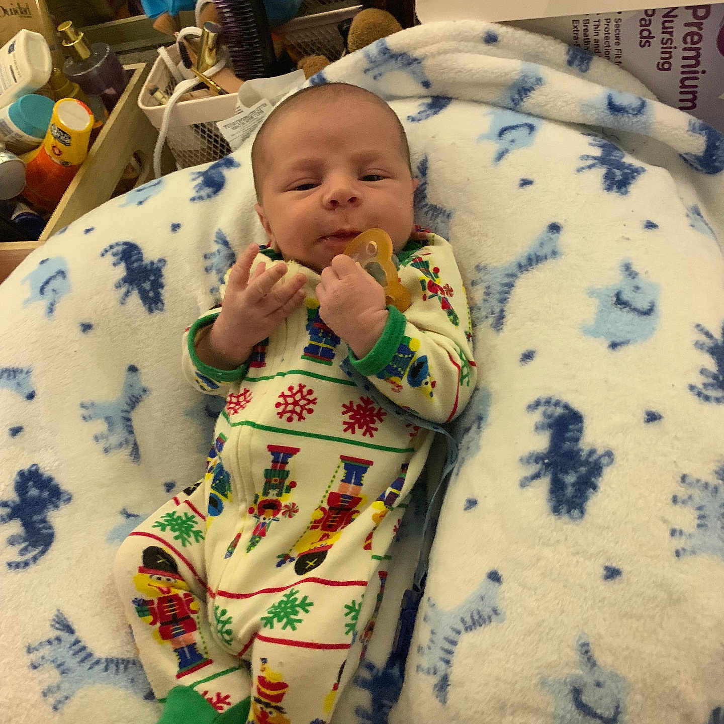 Trayvion is registered to the contest to win money with this photo: architecture, baby, bed, blanket, building, clothing, crib, face, furniture, glove, head, hospital, infantbed, newborn, pajamas, person, photography, portrait, quilt, sleeping