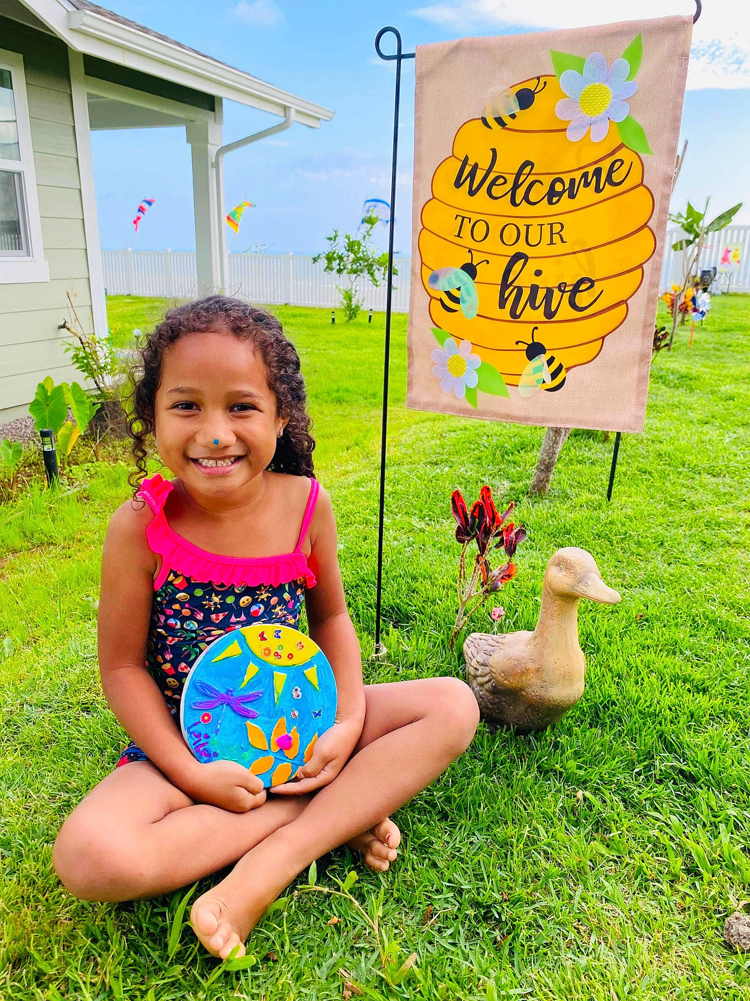 Kalehua joined the competition — help win amazing prizes! adaptation, baby_toddler_clothing, dress, facial_expression, grass, grass_family, happy, house, joy, leisure, morning, natural_environment, people_in_nature, person, pink, plant, public_space, sky, smile, summer