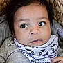 Mateo is registered to the contest to win money with this photo: baby, basket, bed, clothing, cushion, face, frown, furniture, happy, head, homedecor, knitwear, newborn, person, photography, portrait, sad, scarf, smile, sweater