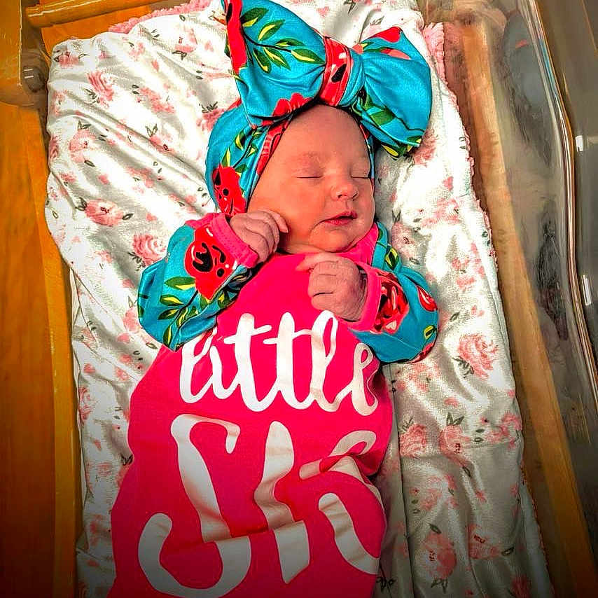 Serenity joined the competition — help win amazing prizes! architecture, baby, bed, blanket, building, clothing, crib, cushion, face, furniture, hat, head, homedecor, infantbed, newborn, person, photography, portrait, quilt, sleeping