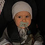 Mathis a rejoint le concours — aidez-le/la à gagner de superbes lots ! baby, child, car_seat, pacifier, hat, knitted_hat, blue_eyes, striped_pajamas, seat_belt, infant, cute, indoors, hands, clothing, sitting, safety, portrait, young_child, baby_accessory, calm