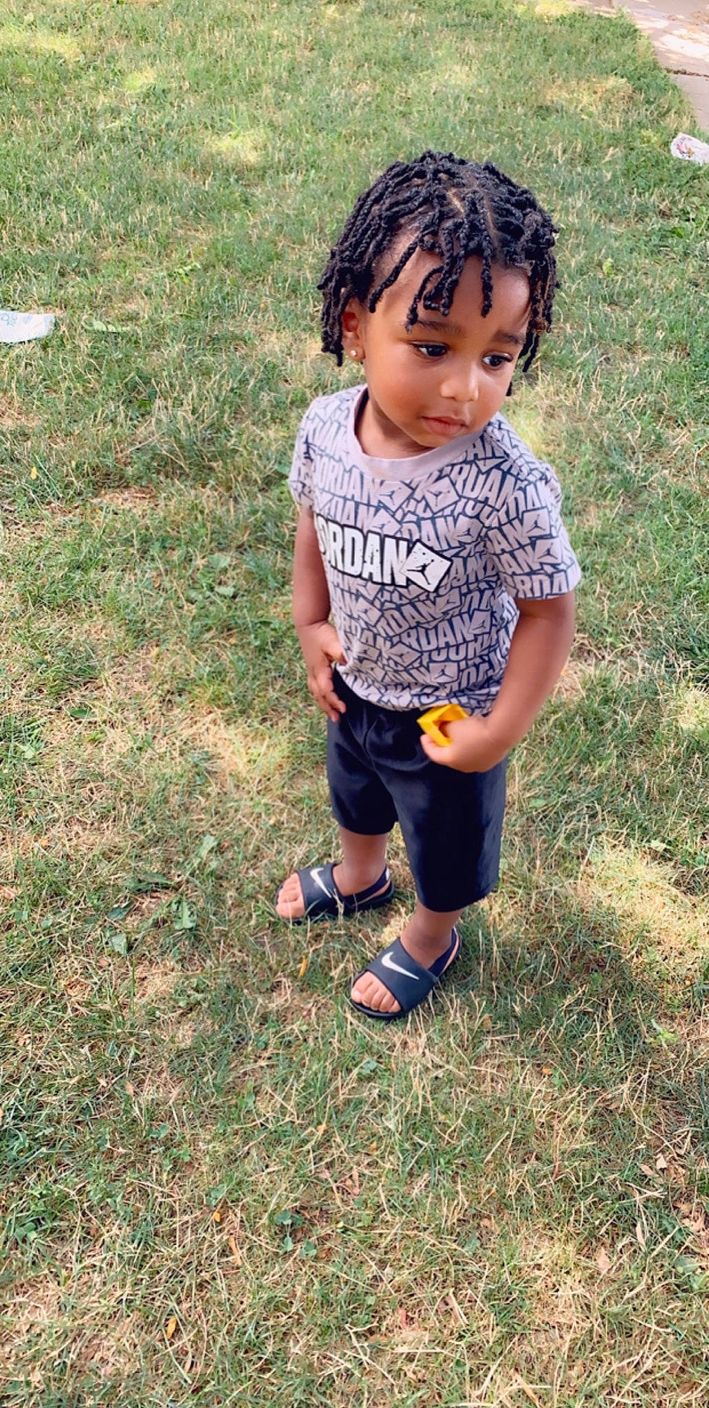 Kennie is registered to the contest to win money with this photo: adaptation, child, grass, person, play, smile, toddler