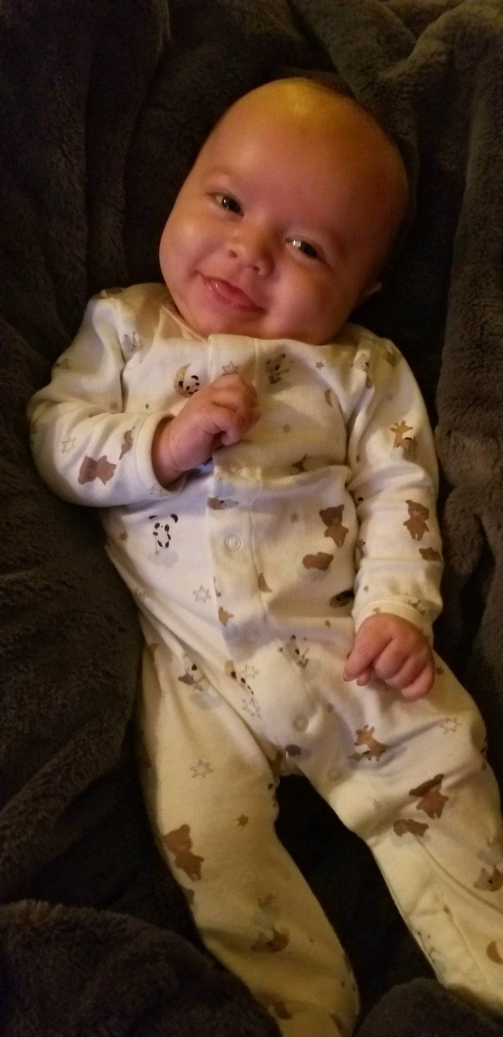 Waylon is registered to the contest to win money with this photo: arm, baby, baby_products, baby_safety, baby_toddler_clothing, cheek, chin, collar, comfort, face, finger, gesture, head, linens, nose, person, skin, sleeve, smile, thumb