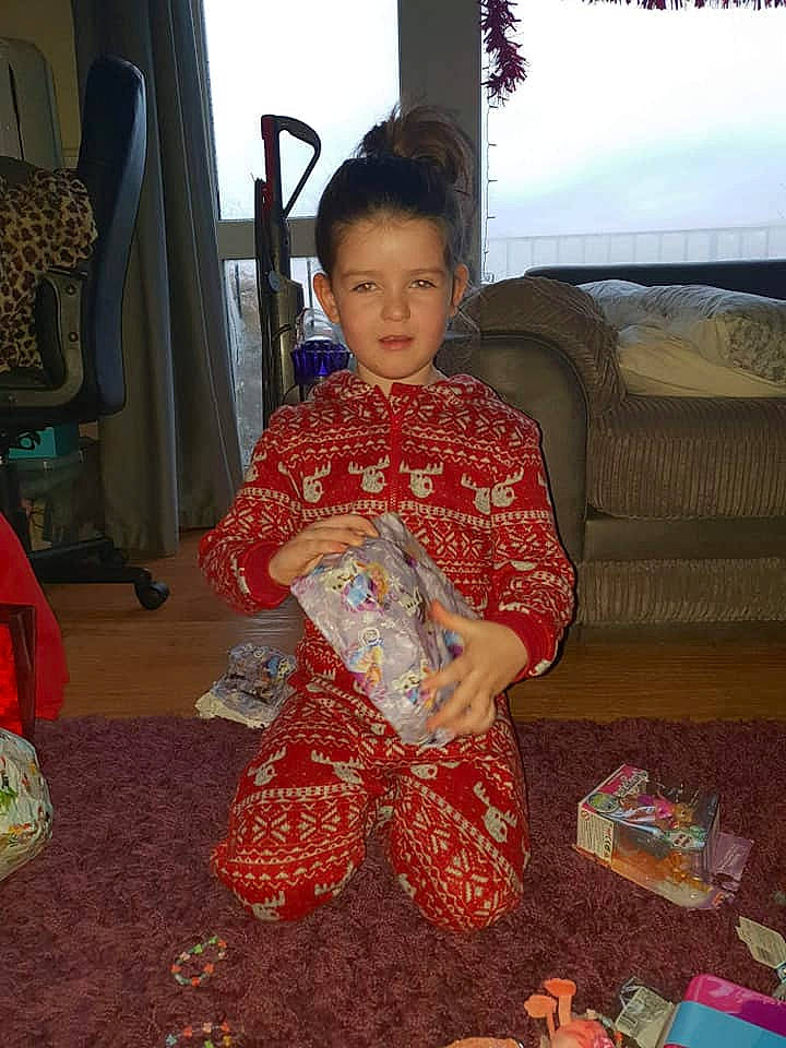 Ava is registered to the contest to win money with this photo: adaptation, child, person, sitting, textile