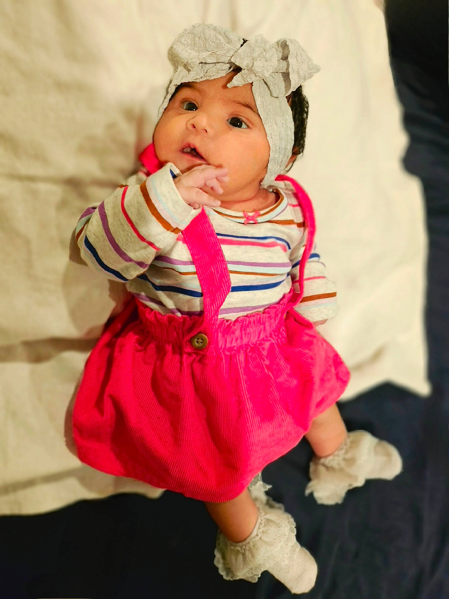 Lorelai joined the competition — help win amazing prizes! baby, baby_toddler_clothing, cap, cheek, child, day_dress, dress, eye, face, fashion_accessory, happy, hat, headband, headgear, headwear, magenta, pattern, person, pink, skin