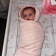 Averie-Bay is registered to the contest to win money with this photo: baby, towel, wrapped, infant, changing_pad, pink, blanket, face, eyes, bedroom, baby_products, soft_texture, newborn, cute, portrait, lying_down, child, indoors, person, baby_care