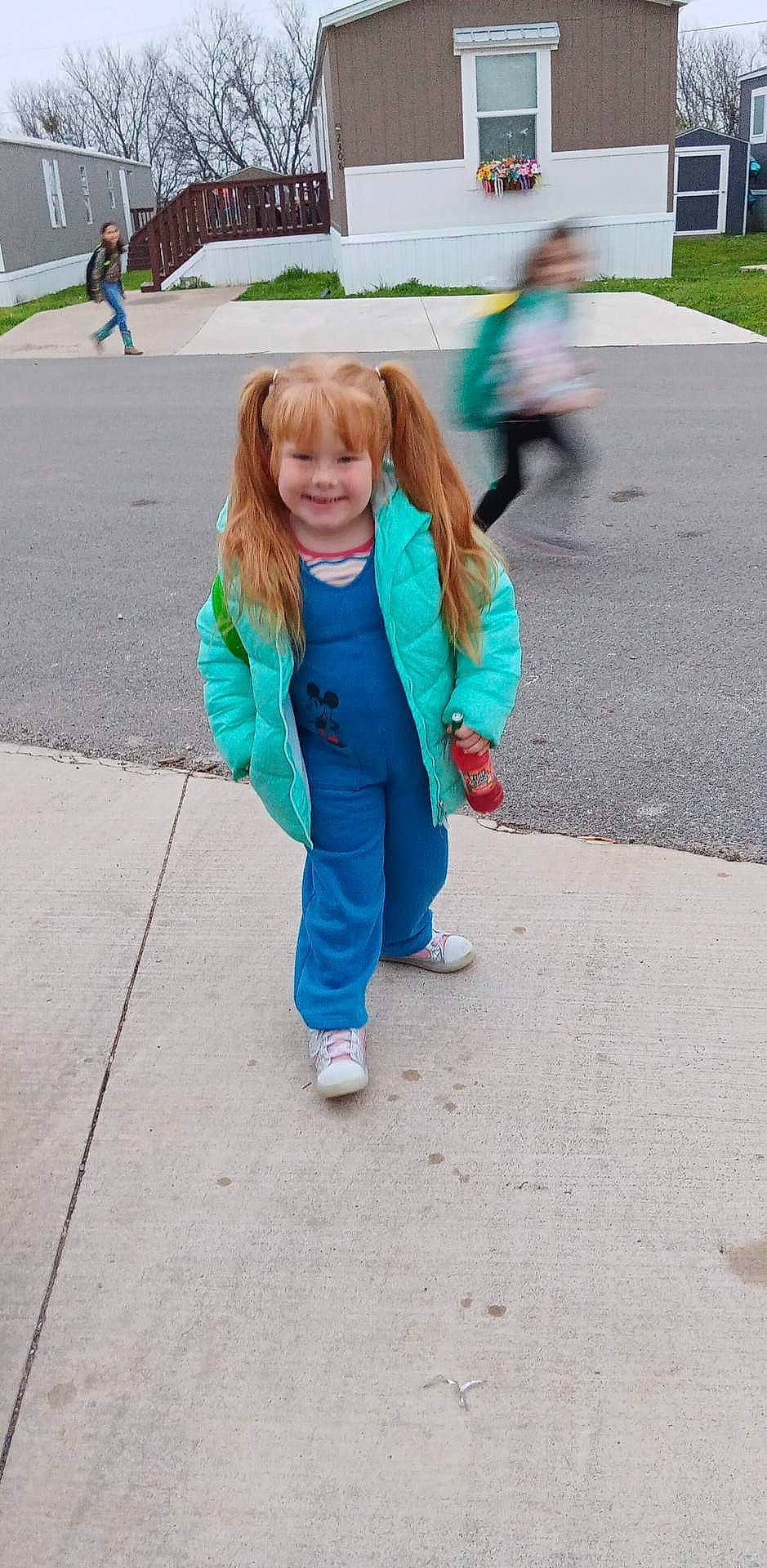 Willo is registered to the contest to win money with this photo: asphalt, denim, electric_blue, fashion_accessory, fun, fur, grass, green, happy, human_leg, joy, leisure, pedestrian, person, play, recreation, road, sidewalk, smile, street