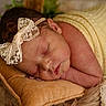Kelsie joined the competition — help win amazing prizes! newborn, baby, sleeping, blanket, pillow, headband, lace, infant, peaceful, soft, closeup, portrait, cozy, yellow, orange, cute, rest, child, indoors, toddler