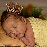 Kelsie joined the competition — help win amazing prizes! newborn, baby, sleeping, crown, pillow, blanket, yellow, pearl, soft, cute, infant, resting, portrait, indoors, peaceful, wrapped, child, head, face, cozy