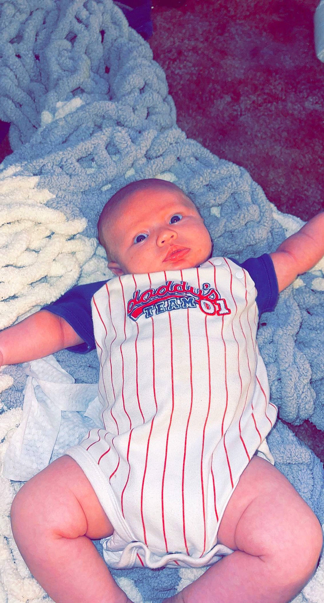 Keaton joined the competition — help win amazing prizes! azure, baby, baby_toddler_clothing, comfort, cool, eye, finger, human, human_body, lap, leg, mouth, muscle, organ, person, pink, skin, textile, thigh, toddler