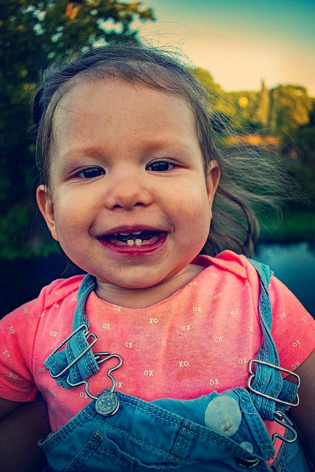 Sammie is registered to the contest to win money with this photo: baby_toddler_clothing, child, cool, flash_photography, fun, grass, happy, iris, joy, leisure, lip, people_in_nature, person, pink, plant, skin, sky, smile, sunlight, t_shirt